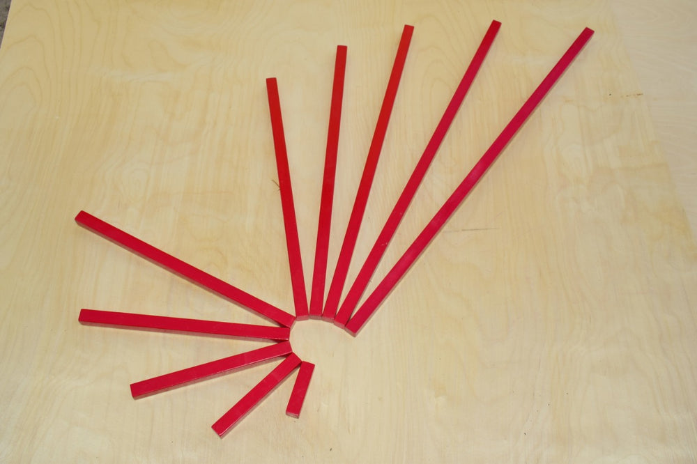 Red Wooden Sticks - عصيان خشبية حمراء